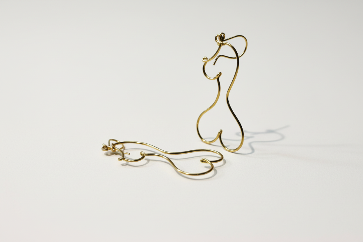 Boucles d’oreilles en argent 925, bijou fait main au design fin et élégant.