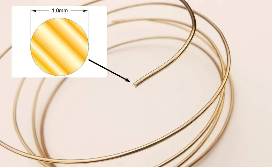 Boucles d’oreilles Arc et Flèche en fil doré – Design symbolique